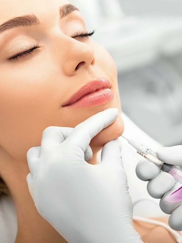 Woman,During,Skin,Tightening,Procedure,,Injection,Of,Dermal,Filler,Into